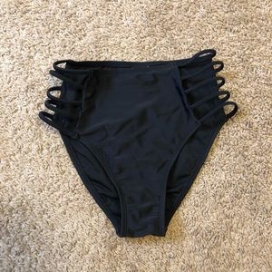 black strappy bathing suit